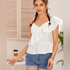 Ruffled asymmetrical peplum top.